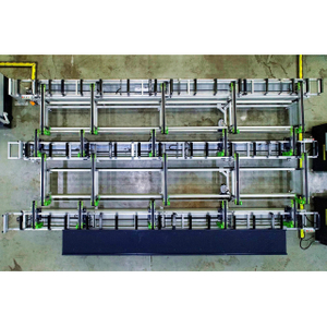 Automatic conveying system between three machines